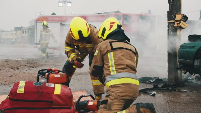 firefighters on the car crash accident scene. High quality 4k footage