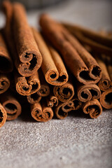 Bunch of cinnamon sticks. Food background.