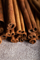 Bunch of cinnamon sticks. Food background.