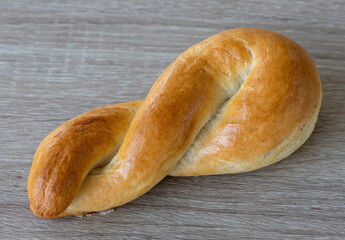 Freshly baked braided Brioche bread bun 
