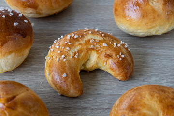 Freshly baked Brioche bun in doughnut shape with sesame seeds