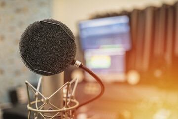 Music on sound mixer in recording studio.