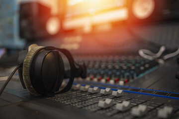 Plakat Music on sound mixer in recording studio.