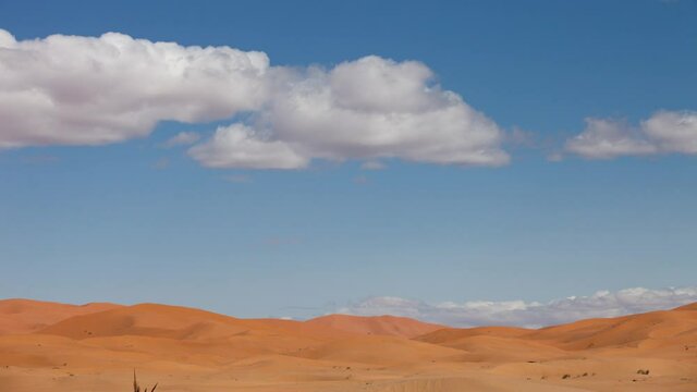 Time lapse of shadows on sand dunes in Sahara desert