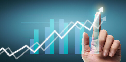 Hand touching a graphs of financial indicator accounting market economy analysis chart