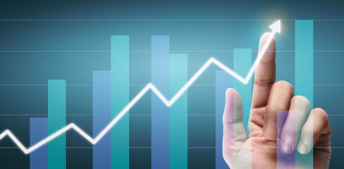 Hand touching a graphs of financial indicator accounting market economy analysis chart