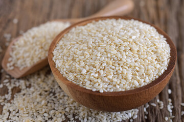 White sesame in a wooden bowl.