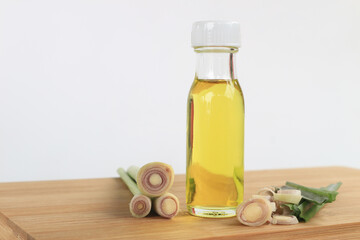Lemongrass, plants, vegetables and herbs of Thailand on wood against a white background.