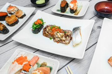 The sushi on the plate is a unique Japanese dish that looks delicious.