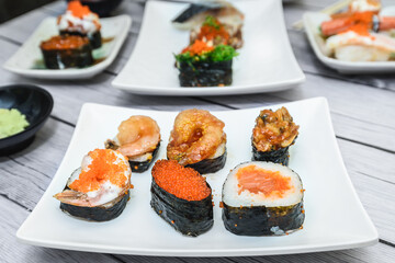The sushi on the plate is a unique Japanese dish that looks delicious.
