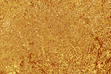 shiny Fortuna Gold plaster on the wall, texture background
