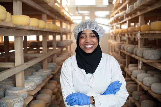 African Black Muslim Business Woman In Local Cheese Production Company