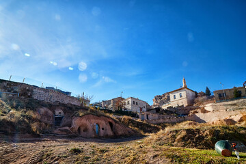 View on Cappadocia rock houses, caves and ruins in Goreme in Anatolia, Turkey. Ruins of an ancient...