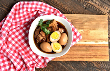 Thai Stewed Pork & Eggs with Five Spices (Thai name is Kai Pa Lo)..Famous Thai egg menu.