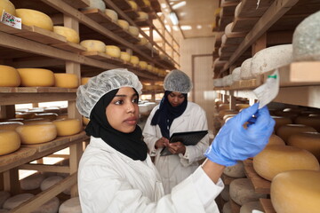 African black muslim business woman in local cheese production company