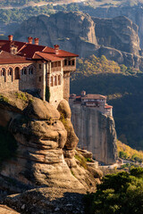 Fototapeta na wymiar varlaam and Roussanou monastery, an unesco world heritage site, located on a unique rock formation above the village of Kalambaka during fall season.