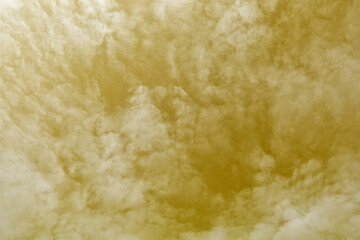 Golden sky with white clouds. Beautiful sky background and wallpaper for design and texture background.
