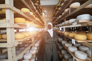 African black muslim business woman in local cheese production company
