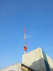 Obraz premium 建築,建物,ビル,重機,クレーン,都市,開発,工事,青空,Japan,city,building,architecture,development,tower