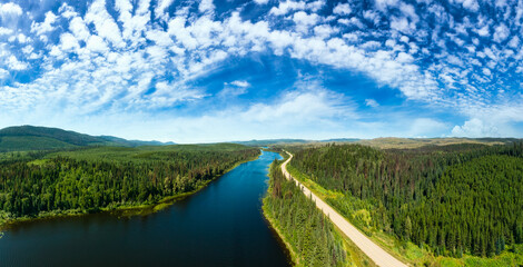 Scenic Panoramic Lake View of Curvy Road in Canadian Nature on a Sunny Summer Day. North of Prince...