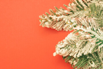 Christmas flat composition of fir branches with copy space for text. Top view on white background