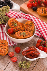 Toasted bread with tomato and oregano.