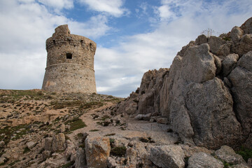Fototapeta na wymiar Ancient Stone Tower of Omigna near the Village of Cargèse on the island of Corsica, France
