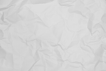 White crumpled paper texture background.