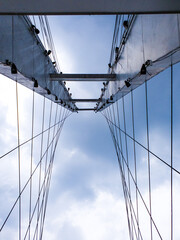 Obraz premium suspension bridge over sky