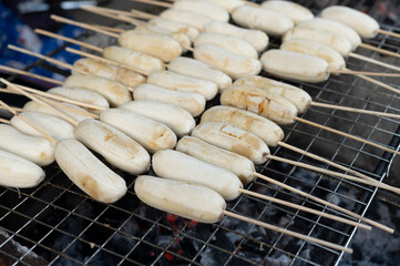 Roast banana on a stove with fired