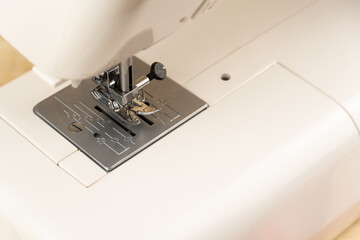 Close-up of a sewing machine. View of the sewing machine foot.