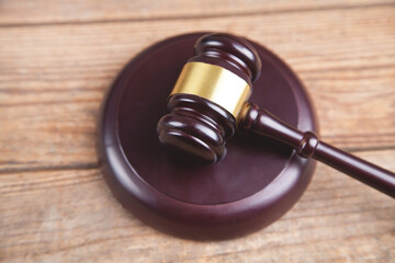 Law and justice concept. Wooden background.