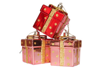 Christmas toys for the Christmas tree and new year, three beautiful red presents isolated on the white background.