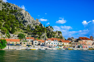 Fototapeta na wymiar View of the Cetina river and the ancient Mirabella fortress in the town of Omis.