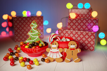 Obraz na płótnie Canvas christmas gingerbread cookies in medical masks on a background of sweets and colorful garland 3D-rendering