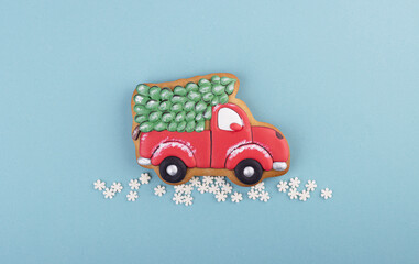 gingerbread truck carries a Christmas tree