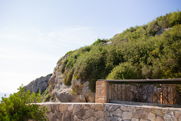 Top view of hilly mountains and sea