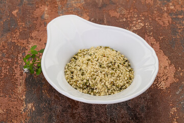 Peeled hemp seeds in the bowl