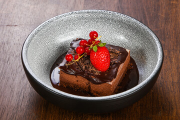 Sweet chocolate cake served strawberry