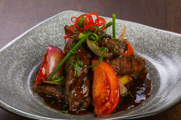 Beef with teriyaki sauce and vegetables