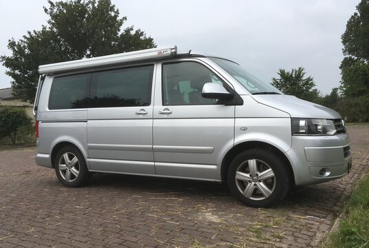 Almere, Flevoland, The Netherlands - June 30, 2017: Gray T6 California parked on a public parking lot in the city of Almere. Nobody in the vehicle.