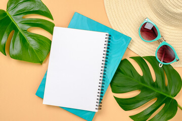Flatlay stylish women clothes and accessories on yellow background. Top view topical monstera...
