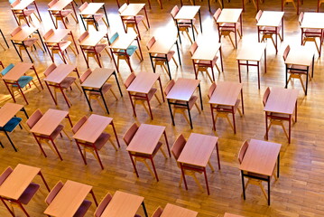 Empty classroom with benches.