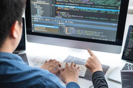 Team of Professional Developer programmer cooperation meeting and brainstorming and programming in website working a software and coding technology, writing codes and database