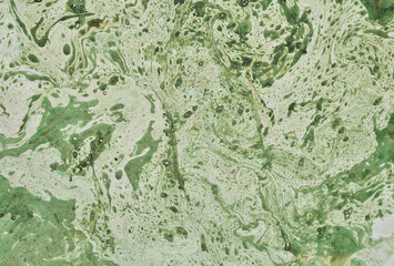 
Mixing water and oil paint. Abstract background.