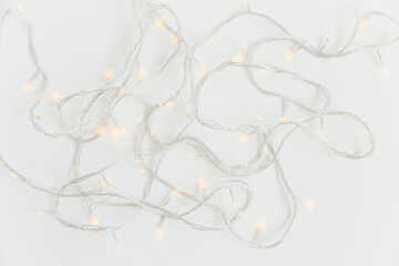 Christmas light garland. White background. Top view