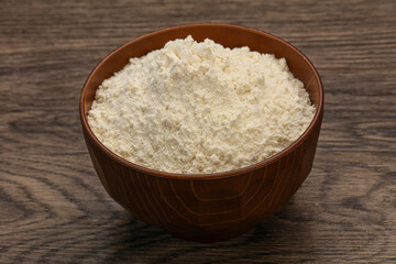 Wheat flour heap in the bowl