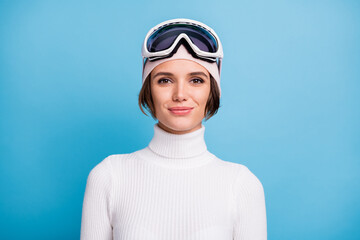 Photo of pretty young woman nice smile vacation in mountains good mood isolated on blue color background