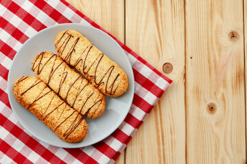 Shortbread cookies on wooden board close up