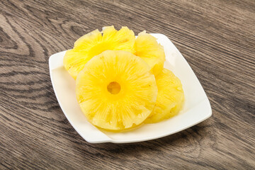 Sweet pineapple rings in the bowl